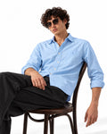 Caddy Couture Oxford Lycra Shirt in Light Blue, seated model view
